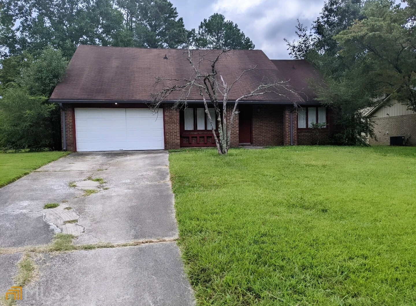a view of a house with a garden
