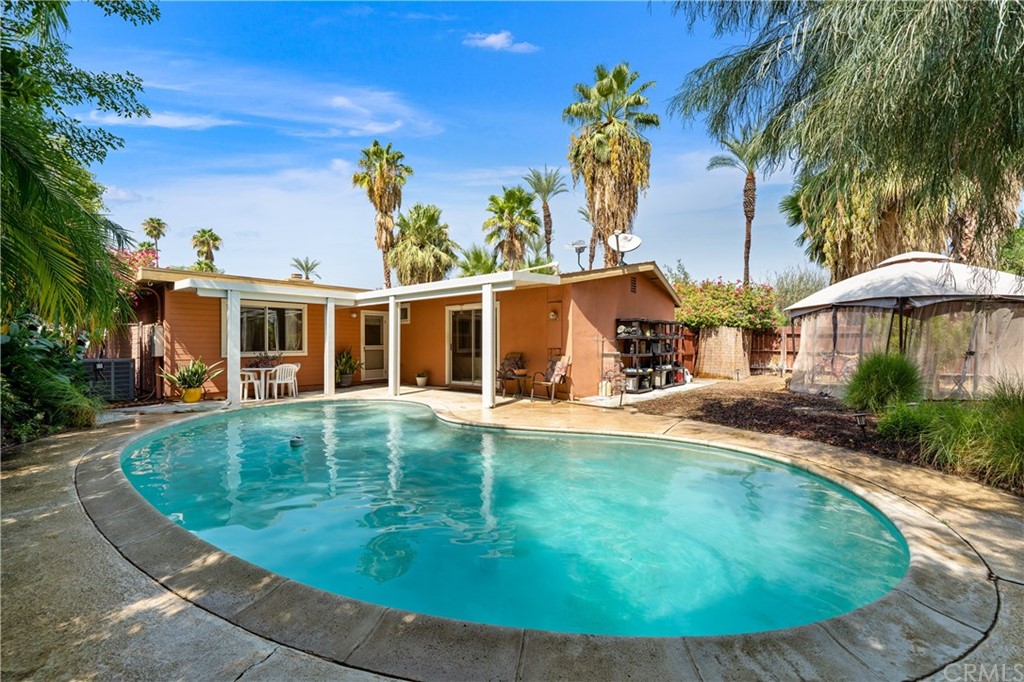 70215 Cobb Road Rancho Mirage, CA 92270 - Photo 1 of 1 front view of a house with a yard
