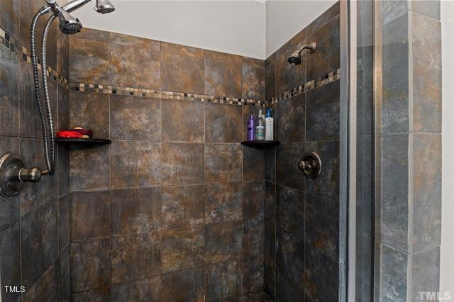 679 Roberts Chapel Road Stem, NC 27581 - Photo 13 of 28 a bathroom with a shower