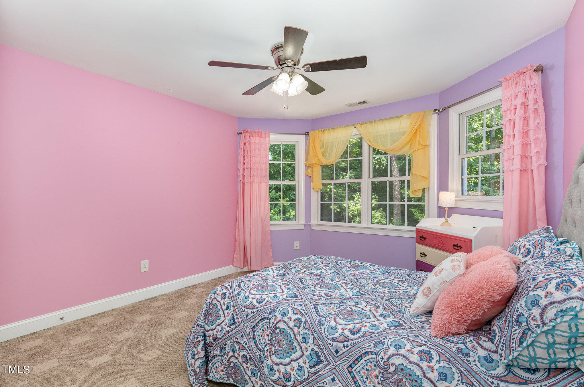 679 Roberts Chapel Road Stem, NC 27581 - Photo 17 of 28 a bed room with a bed and a window