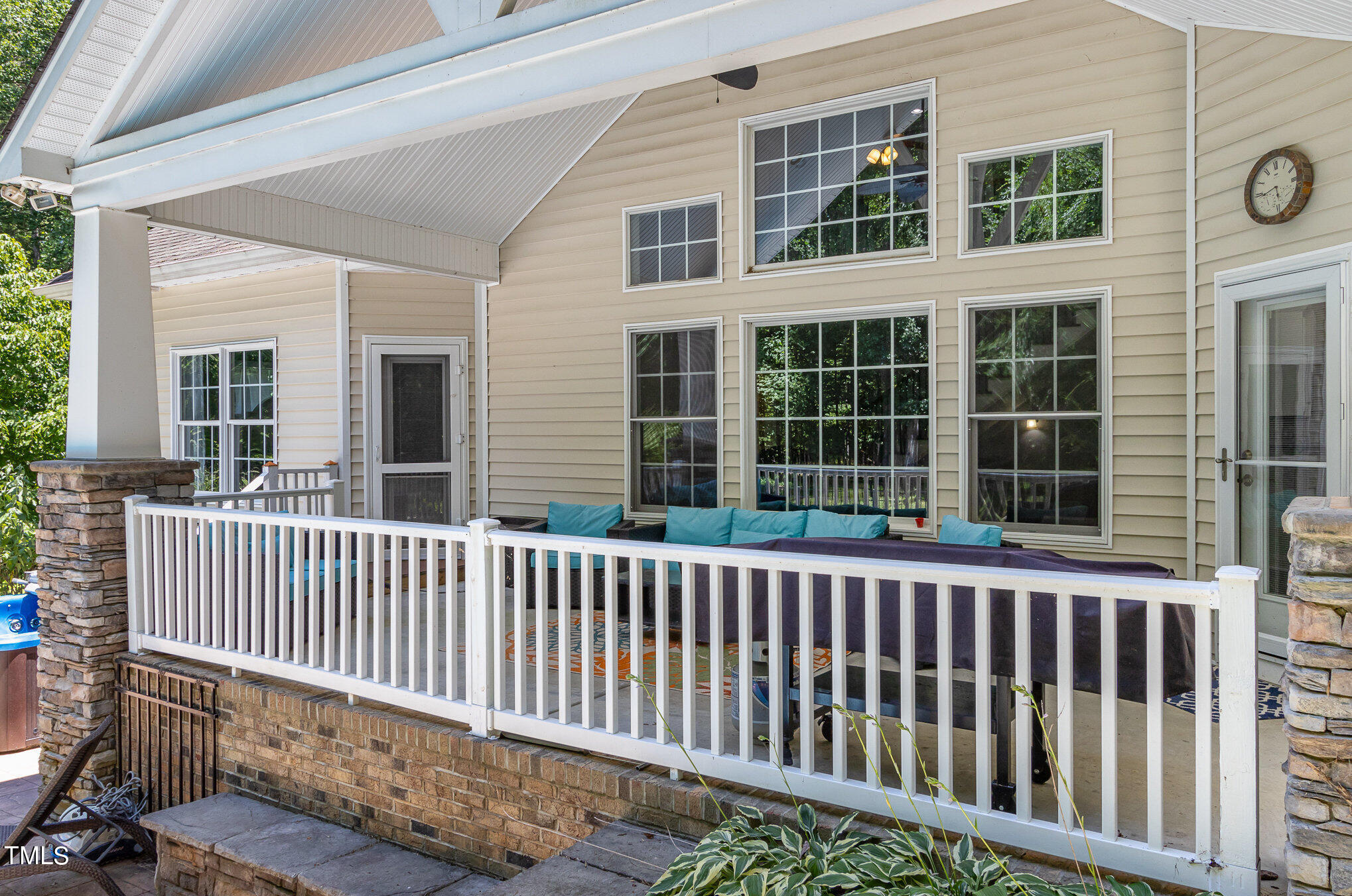 679 Roberts Chapel Road Stem, NC 27581 - Photo 24 of 28 a porch with a bench