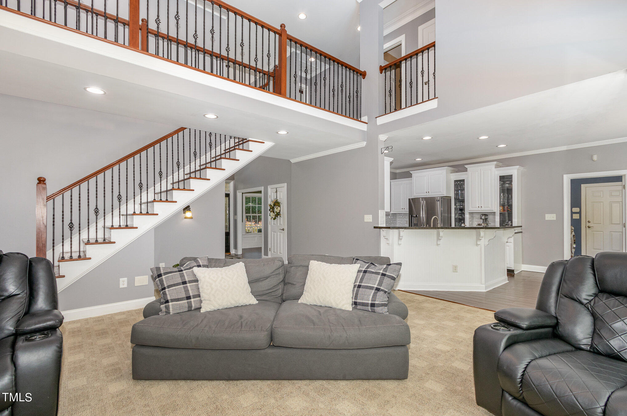 679 Roberts Chapel Road Stem, NC 27581 - Photo 4 of 28 a living room with furniture or stairs and a living room