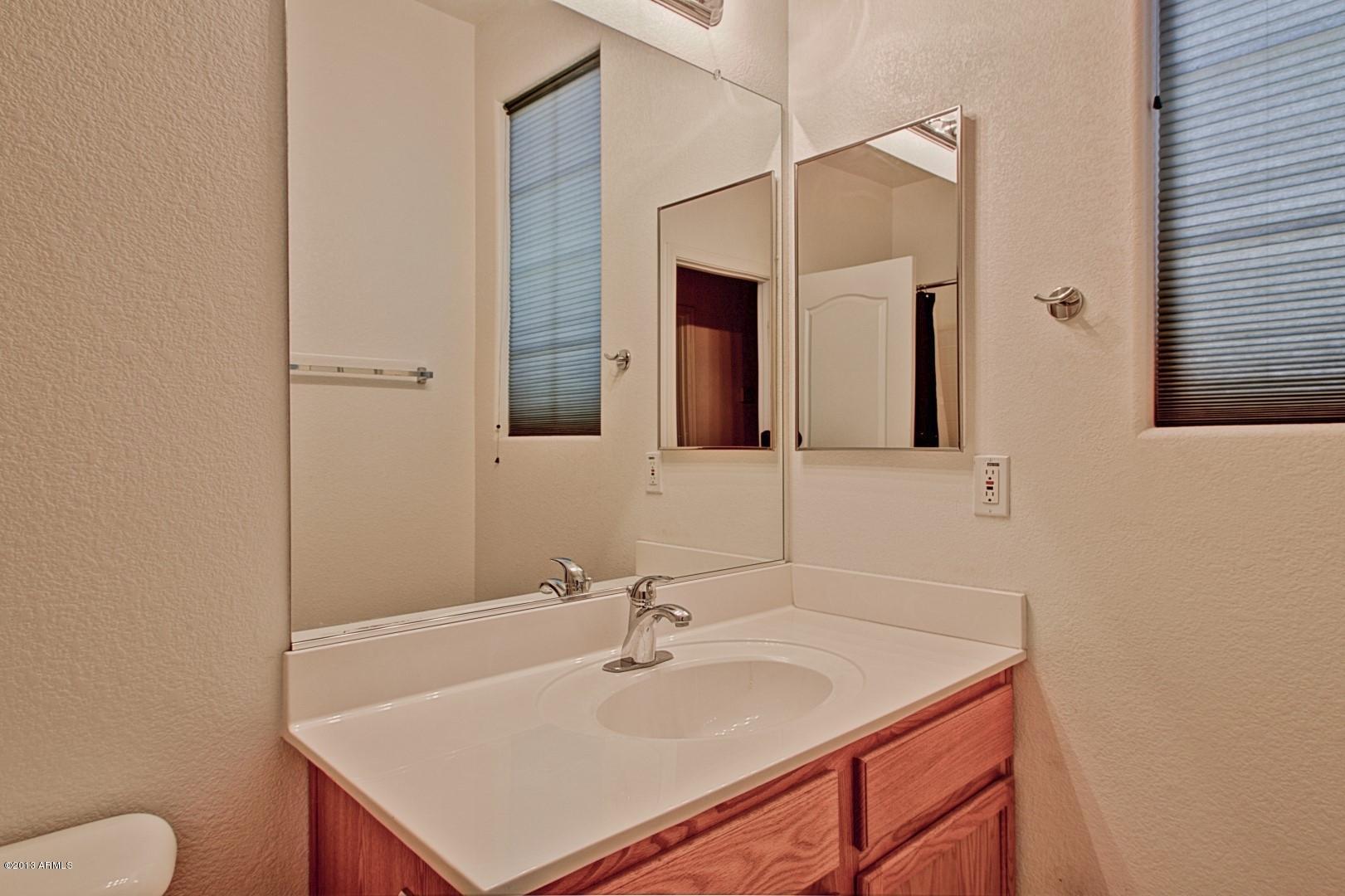 3227 West Maldonado Road Phoenix, AZ 85041 - Photo 16 of 28 Hallway Bathroom