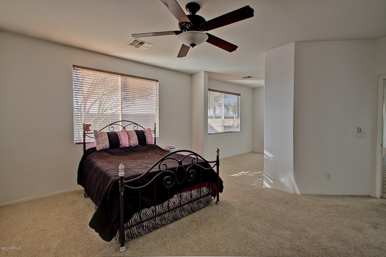 3227 West Maldonado Road Phoenix, AZ 85041 - Photo 18 of 28 Large Master Bedroom w/Sitting Area