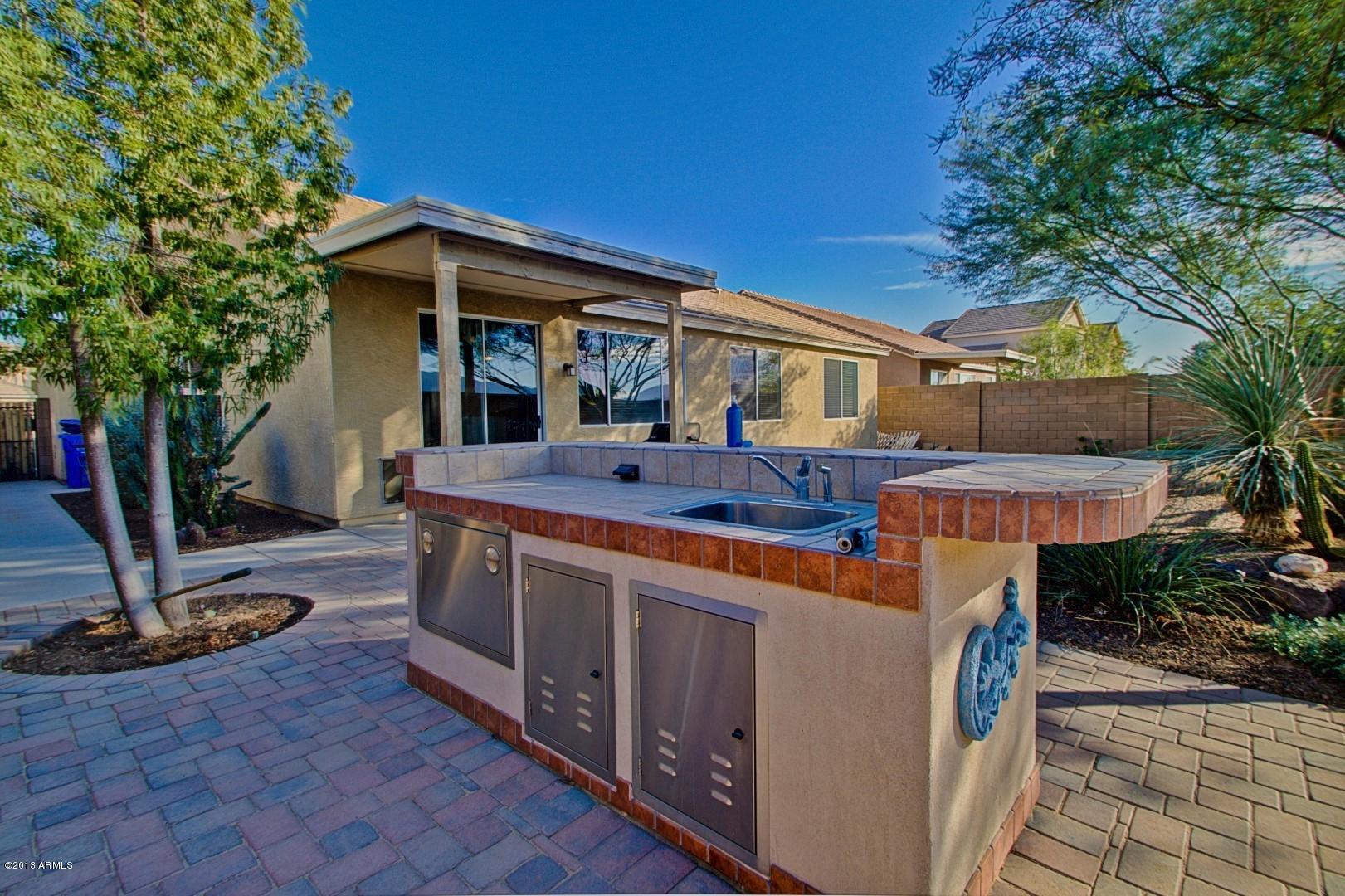3227 West Maldonado Road Phoenix, AZ 85041 - Photo 23 of 28 Backyard w/Built-In Bar