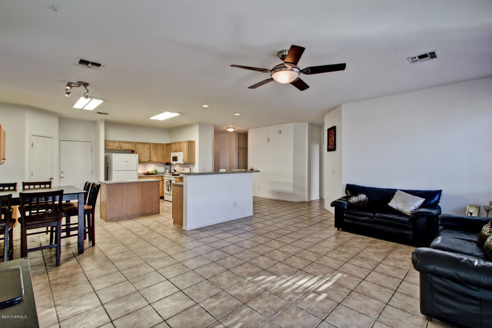 3227 West Maldonado Road Phoenix, AZ 85041 - Photo 6 of 28 Kitchen Opens to Living room