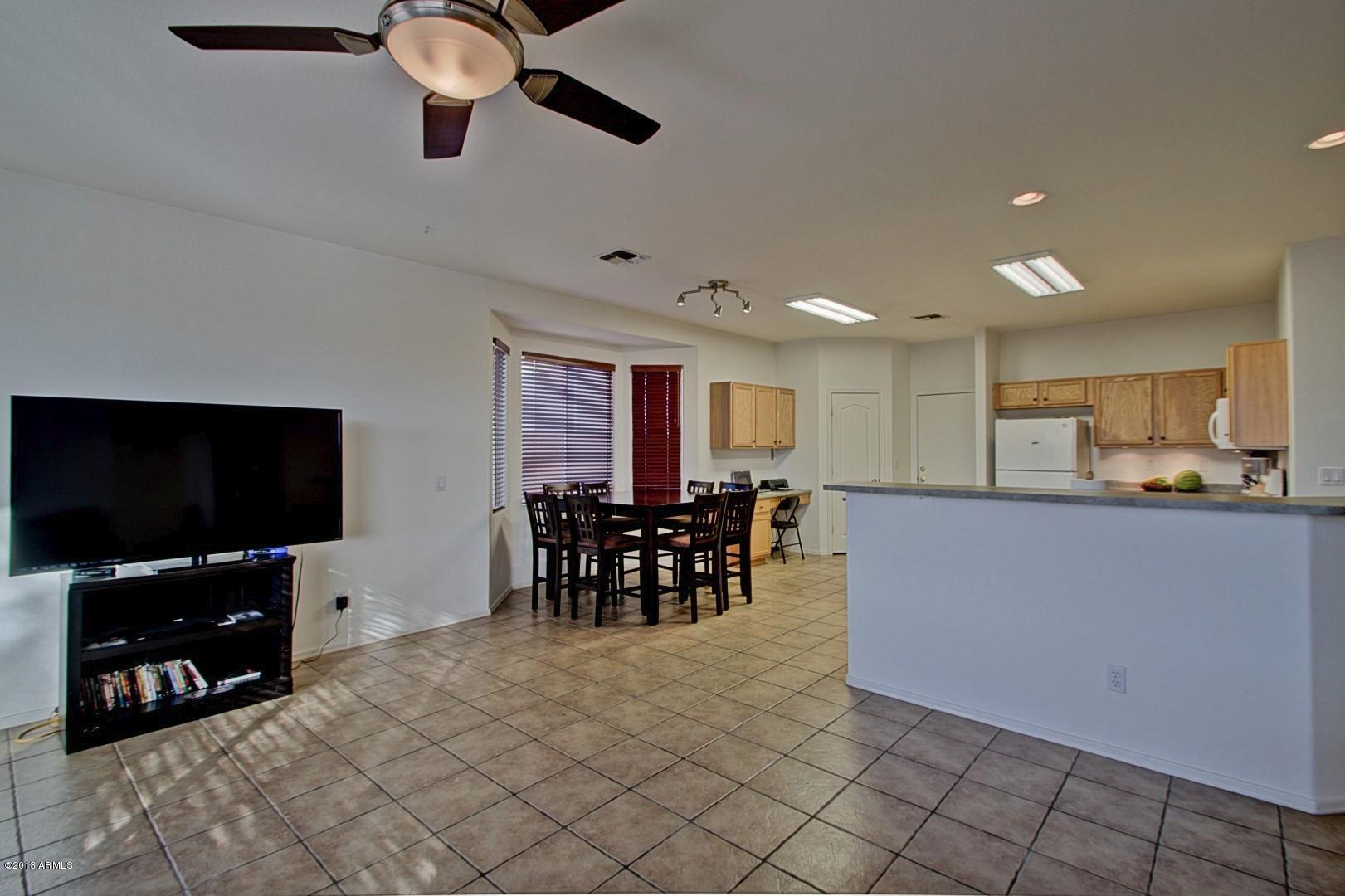 3227 West Maldonado Road Phoenix, AZ 85041 - Photo 7 of 28 Living Room/Kitchen