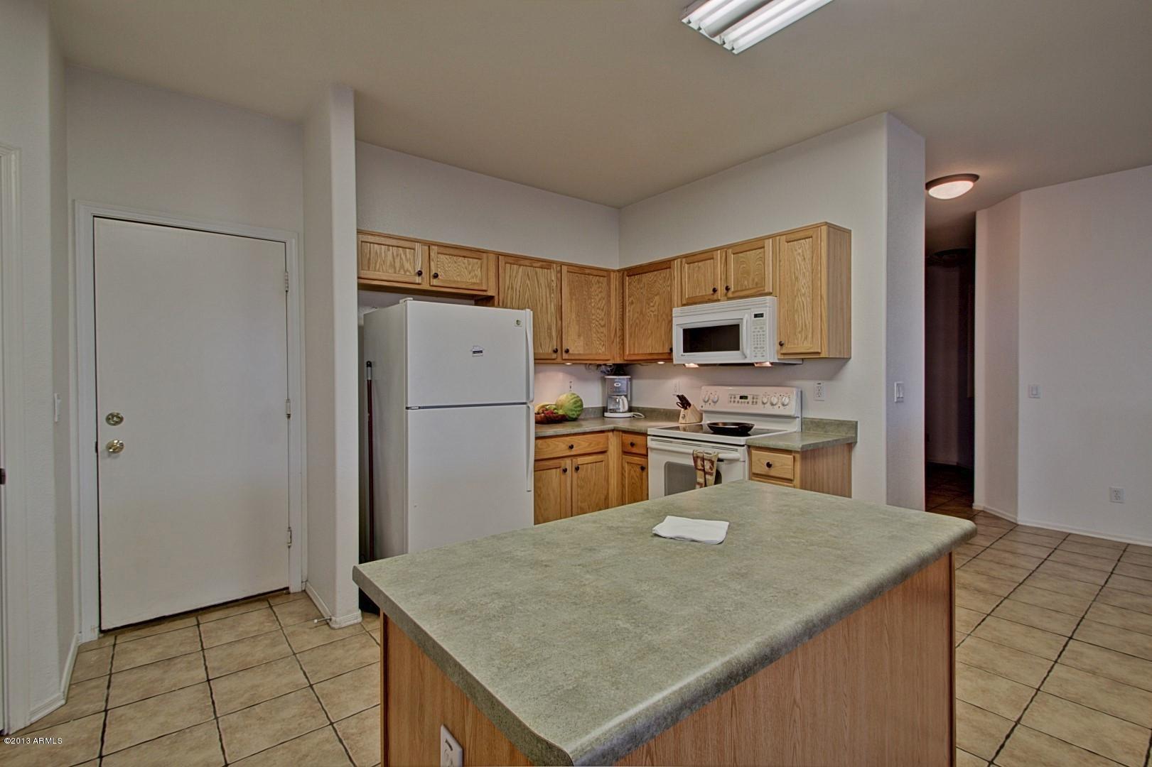 3227 West Maldonado Road Phoenix, AZ 85041 - Photo 9 of 28 Kitchen w/Island