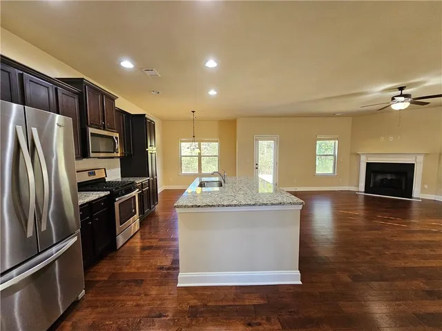 a view of a hallway with windows