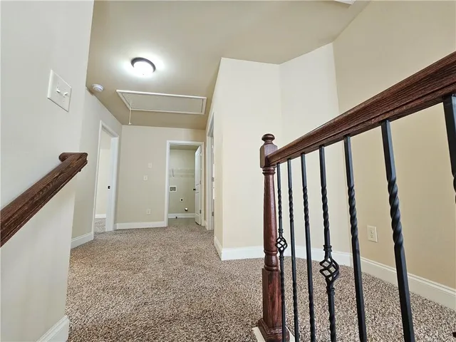 a view of hallway with a window