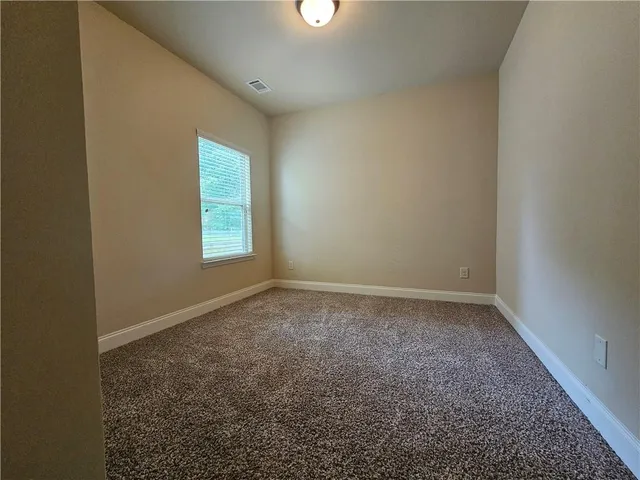 a bathroom with a sink vanity and a mirror