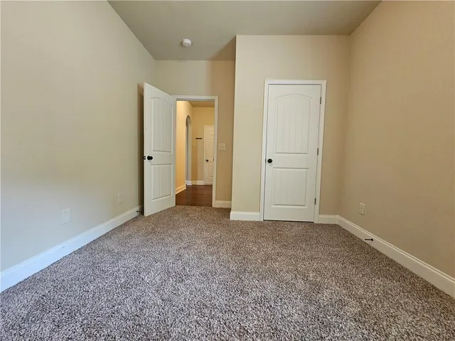 a bathroom with a bathtub and a toilet