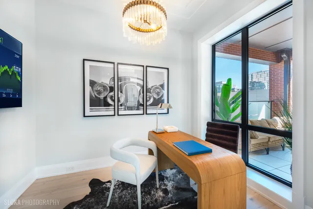 a kitchen with a potted plant on the counter and a potted plant