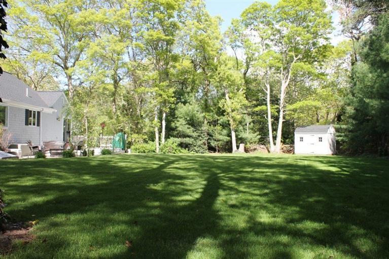 49 Oxner Road Centerville, MA 02632 - Photo 8 of 8 a big yard with large trees
