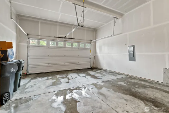 a view of a storage & utility room with racks on the wall