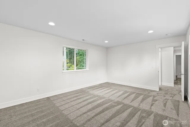 an aerial view of house with yard and mountain view