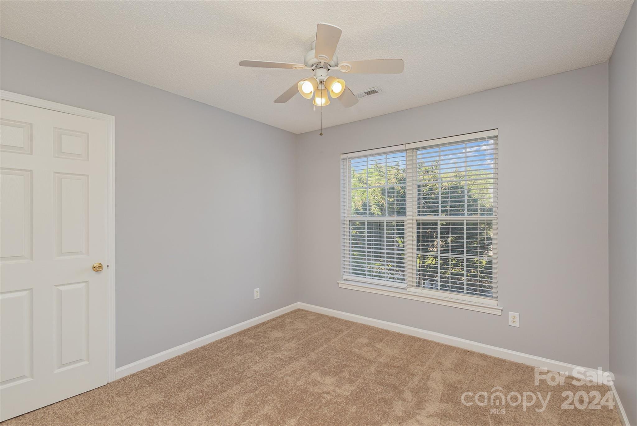 3917 Faith Church Road Indian Trail, NC 28079 - Photo 11 of 19 a view of an empty room with a window