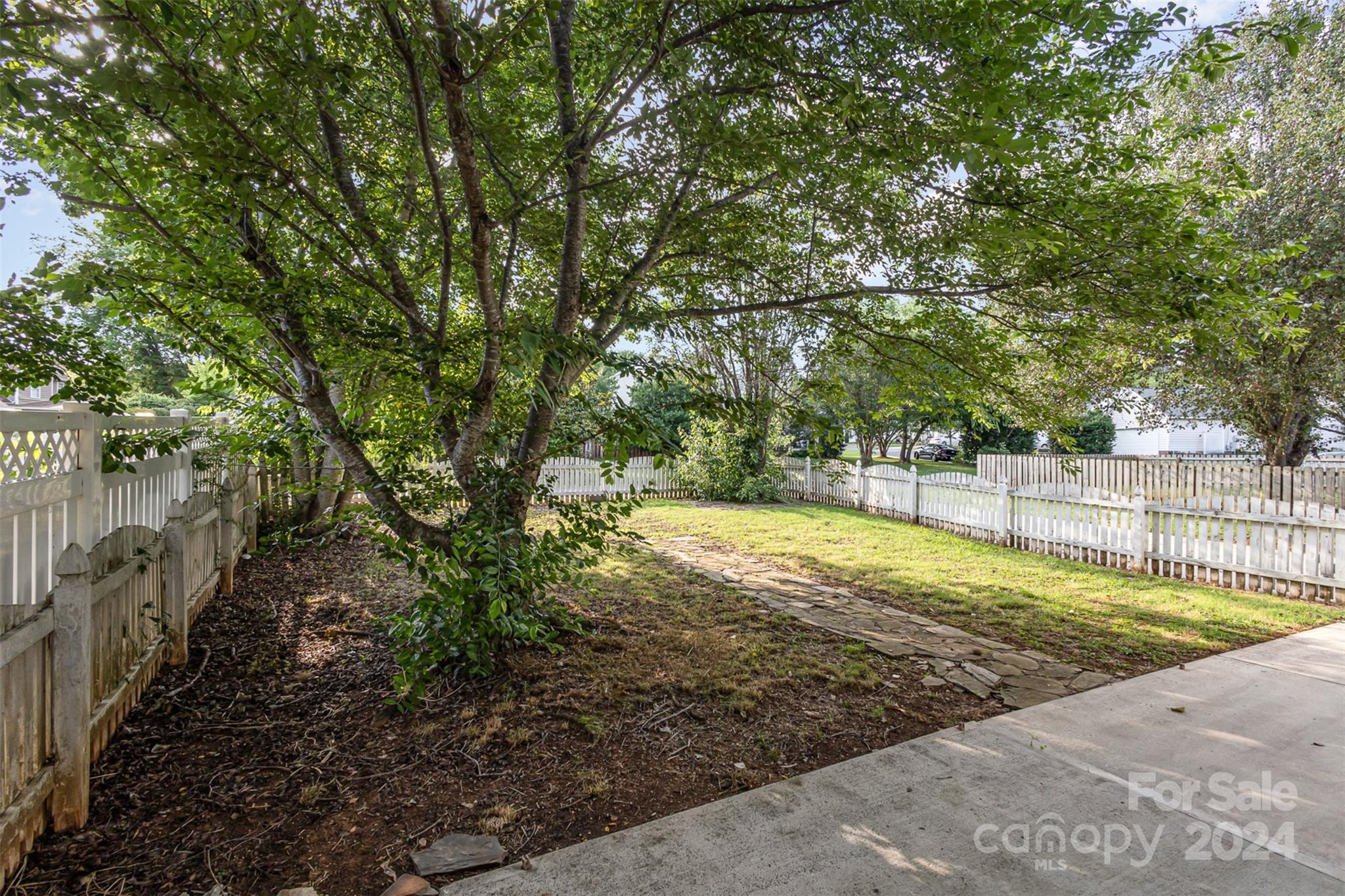 3917 Faith Church Road Indian Trail, NC 28079 - Photo 15 of 19 a view of a swimming pool with an outdoor space