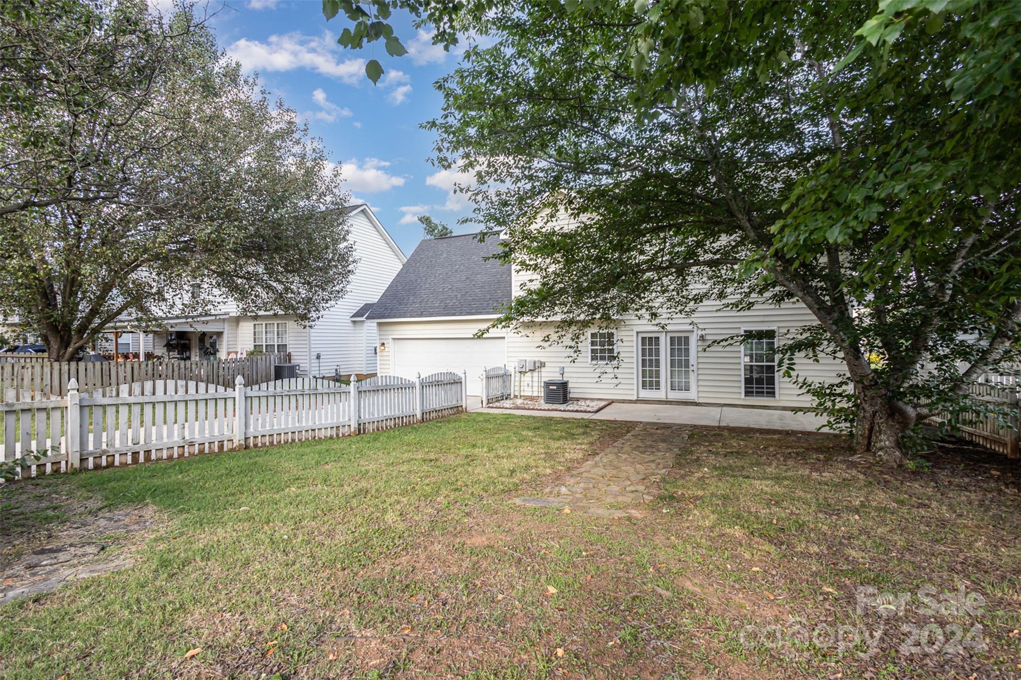 3917 Faith Church Road Indian Trail, NC 28079 - Photo 16 of 19 a view of a house with a yard