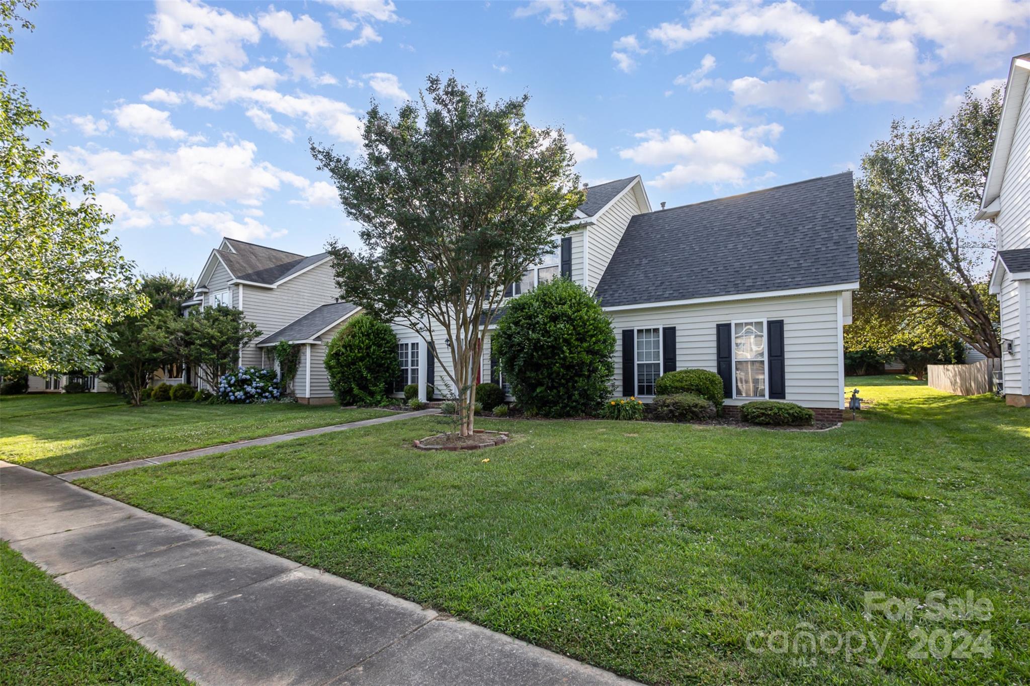 3917 Faith Church Road Indian Trail, NC 28079 - Photo 17 of 19 a front view of a house with a yard
