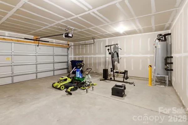 a view of empty room with wooden walls