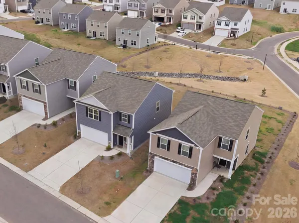 a aerial view of a house with garden