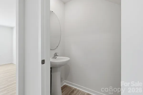 a bathroom with a sink and mirror