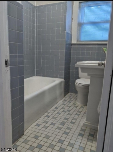 29 Warman Street Montclair, NJ 07042 - Photo 4 of 4 a bathroom with a toilet and a shower