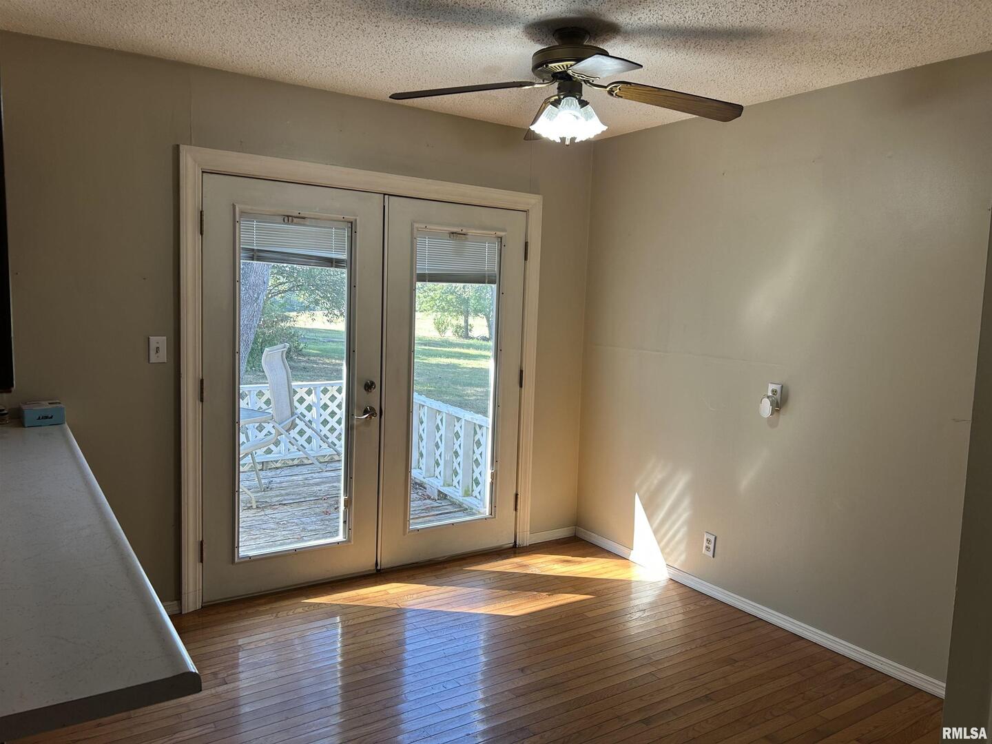 744 Cardinal Road Carbondale, IL 62901 - Photo 5 of 38 wooden floor in an empty room with a window