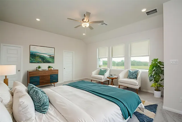 a white sink sitting under a bathroom mirror