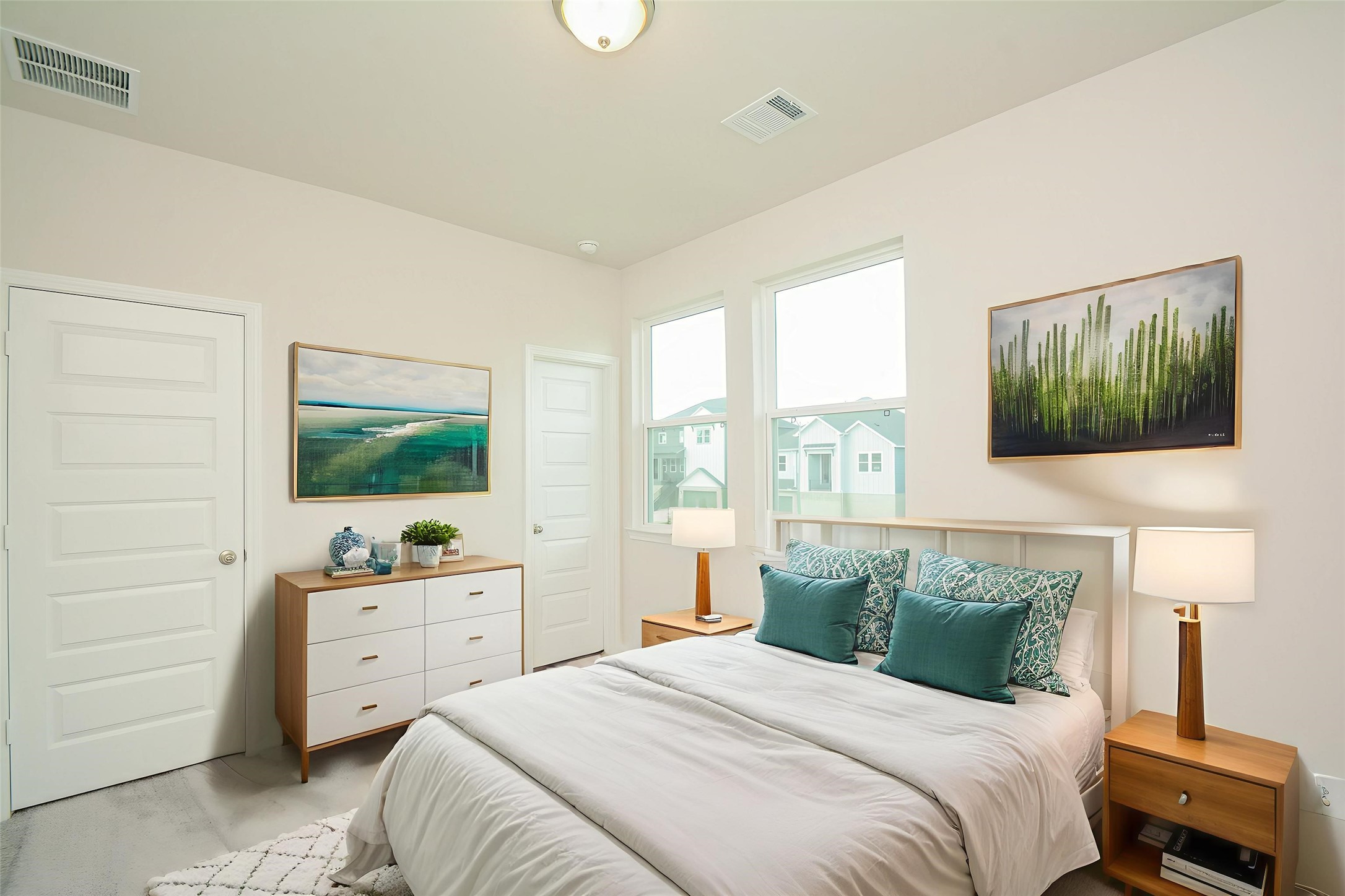 20642 Dynamic Court Humble, TX 77338 - Photo 22 of 32 a bedroom with a bed and a flat tv screen on the dresser