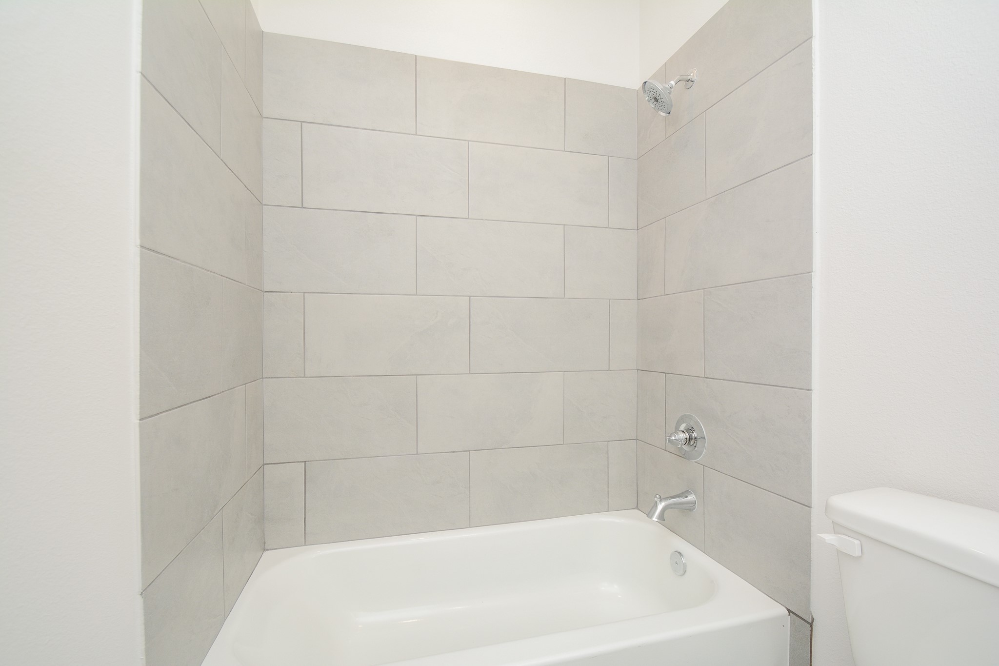 20642 Dynamic Court Humble, TX 77338 - Photo 25 of 32 a close up of a bathtub curtain