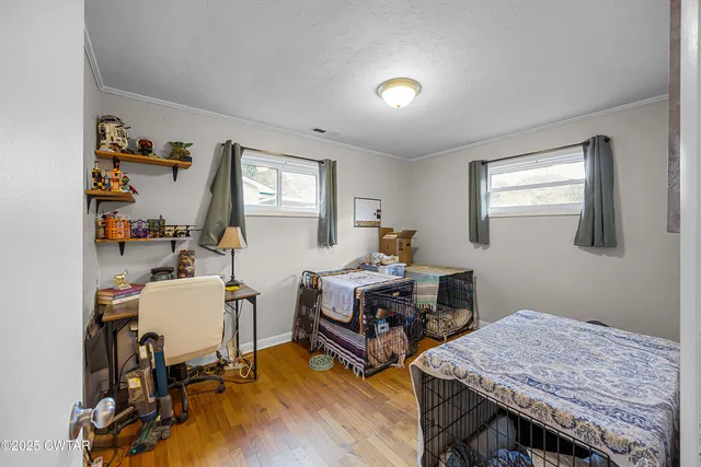 a room with furniture and a wooden floor
