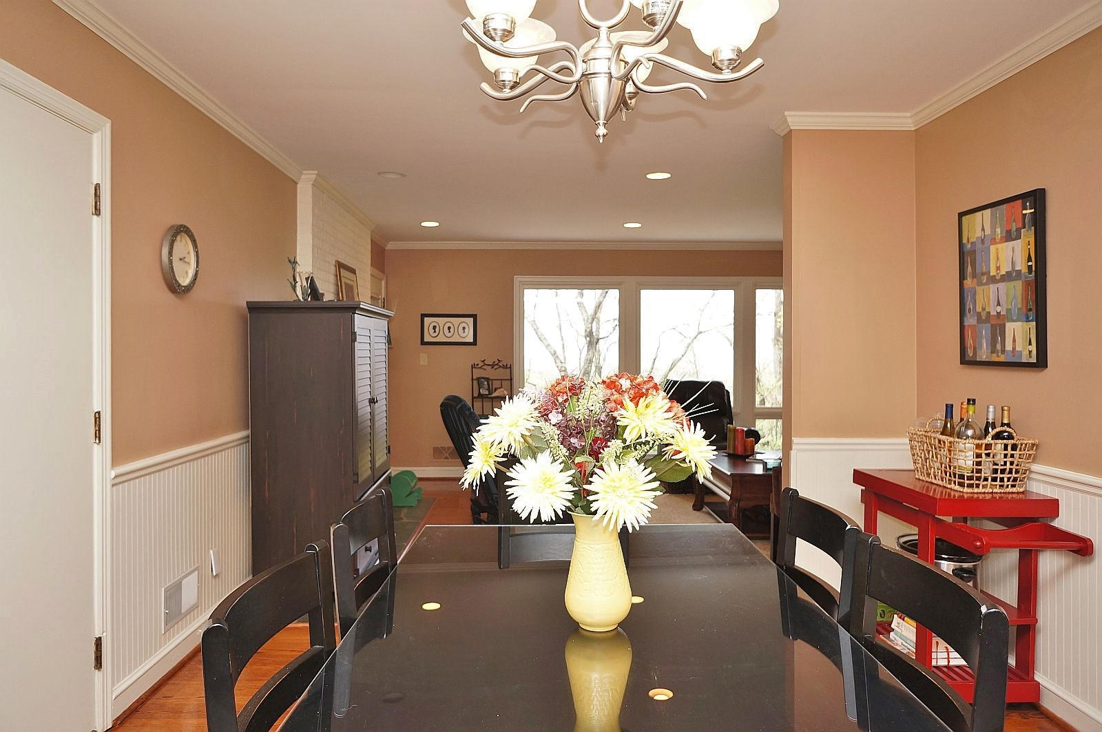 3113 Stoneridge Road Southwest Roanoke, VA 24014 - Photo 9 of 42 a dining room with furniture a potted plant and wooden floor