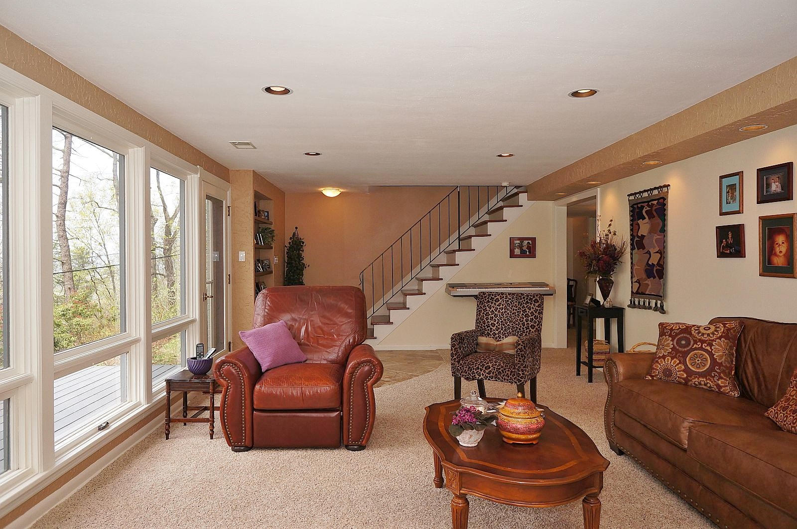 3113 Stoneridge Road Southwest Roanoke, VA 24014 - Photo 27 of 42 a living room with furniture and a large window