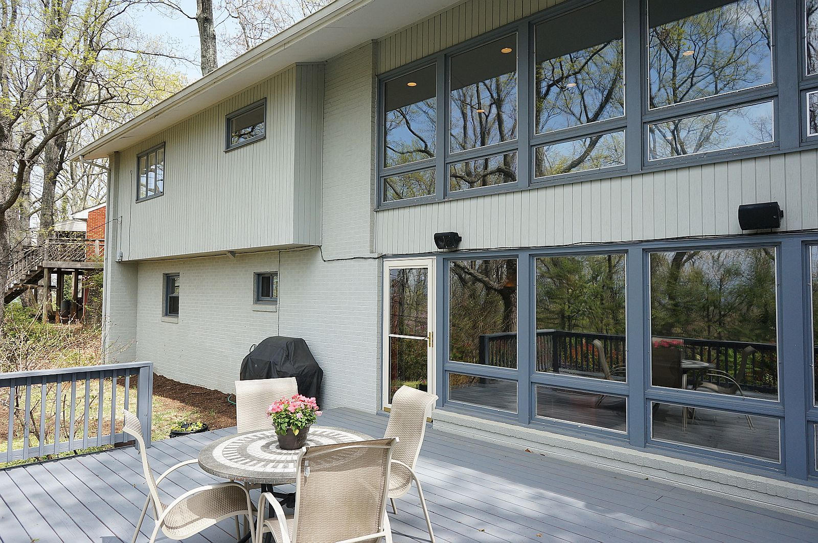 3113 Stoneridge Road Southwest Roanoke, VA 24014 - Photo 34 of 42 a view of a patio with a table and chairs