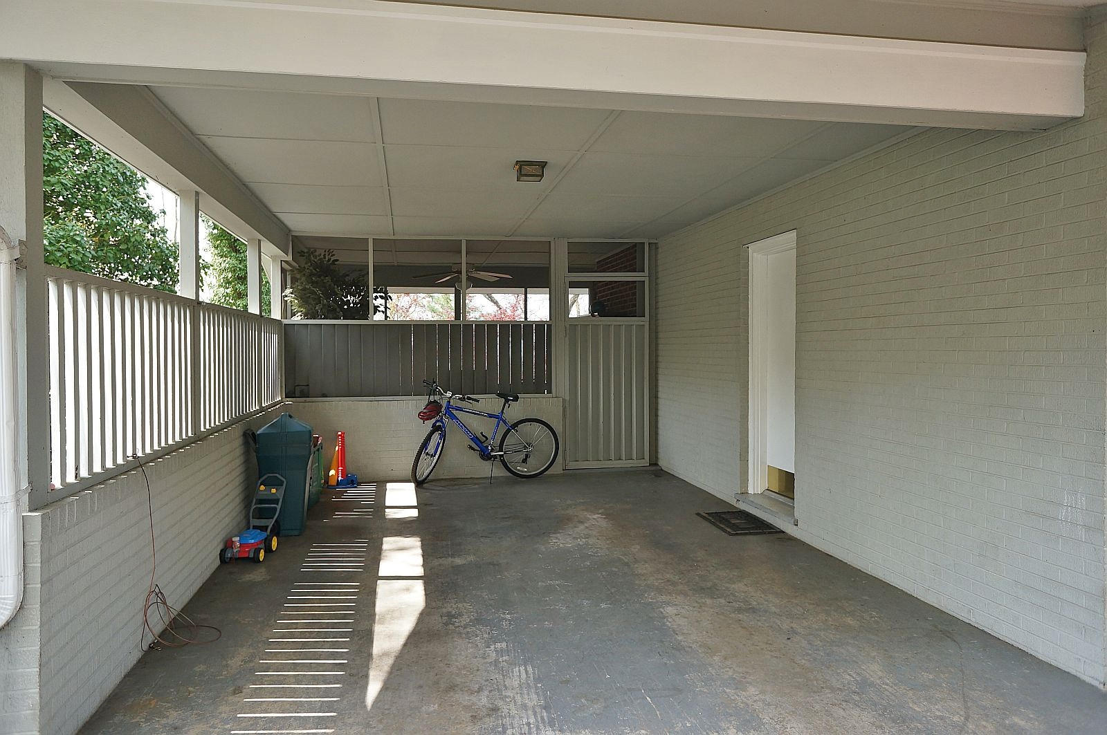 3113 Stoneridge Road Southwest Roanoke, VA 24014 - Photo 36 of 42 a view of a garage with wooden floor and iron stairs
