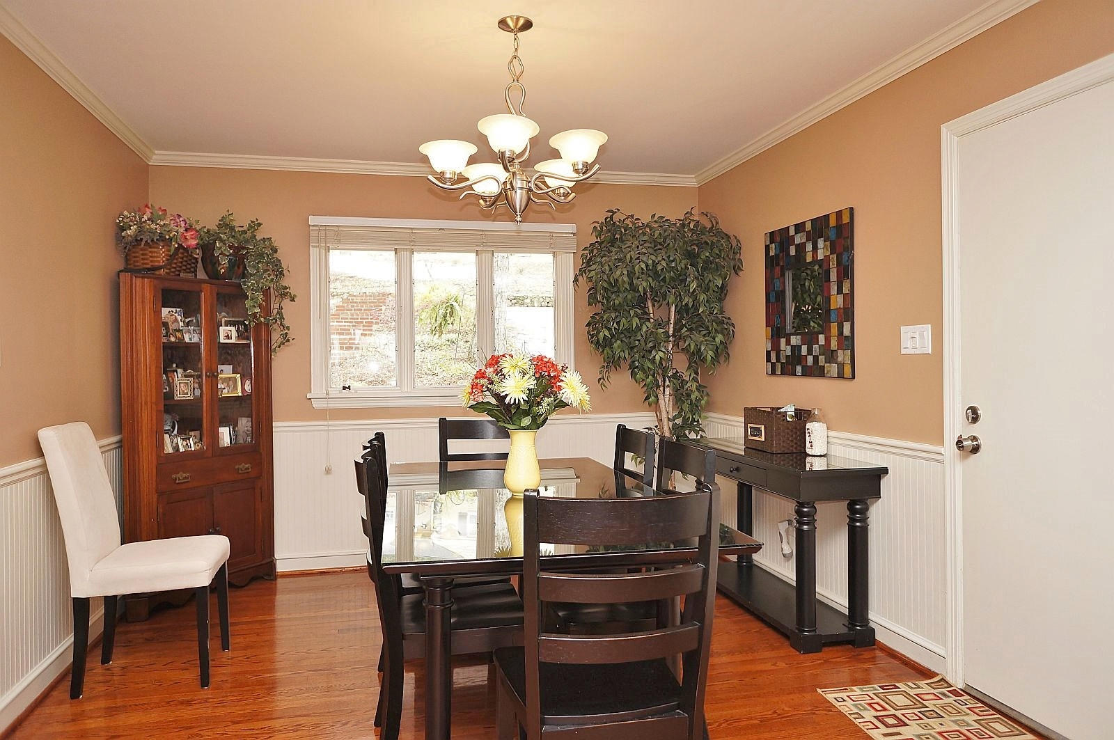 3113 Stoneridge Road Southwest Roanoke, VA 24014 - Photo 8 of 42 a view of a dining room with furniture window and wooden floor