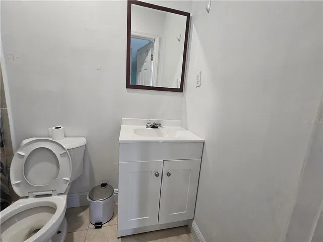 a bathroom with a shower and toilet