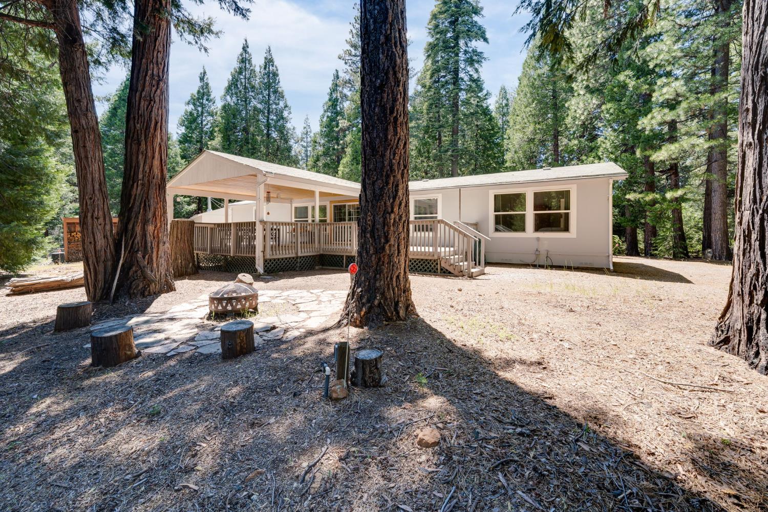 28722 Wood Road Pioneer, CA 95666 - Photo 3 of 39 a view of a house with backyard and sitting area