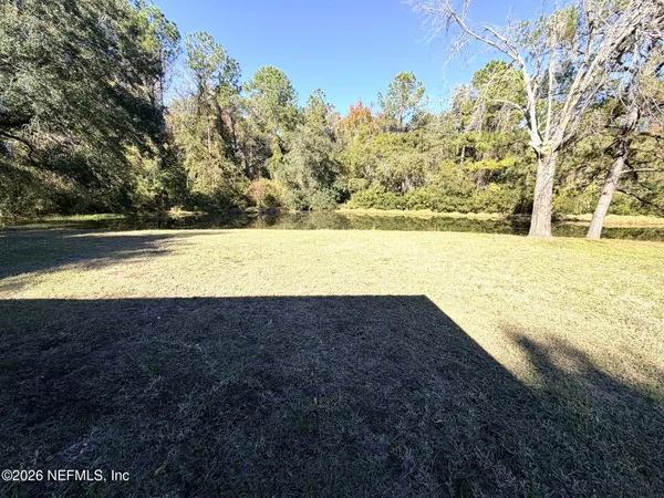 a view of an outdoor space and a lake view