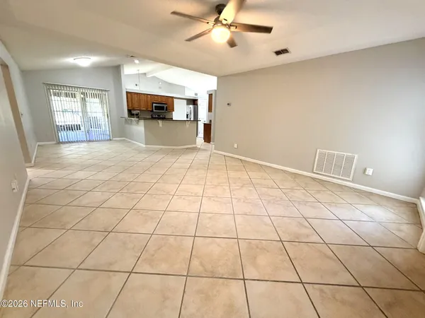 a view of an empty room and window