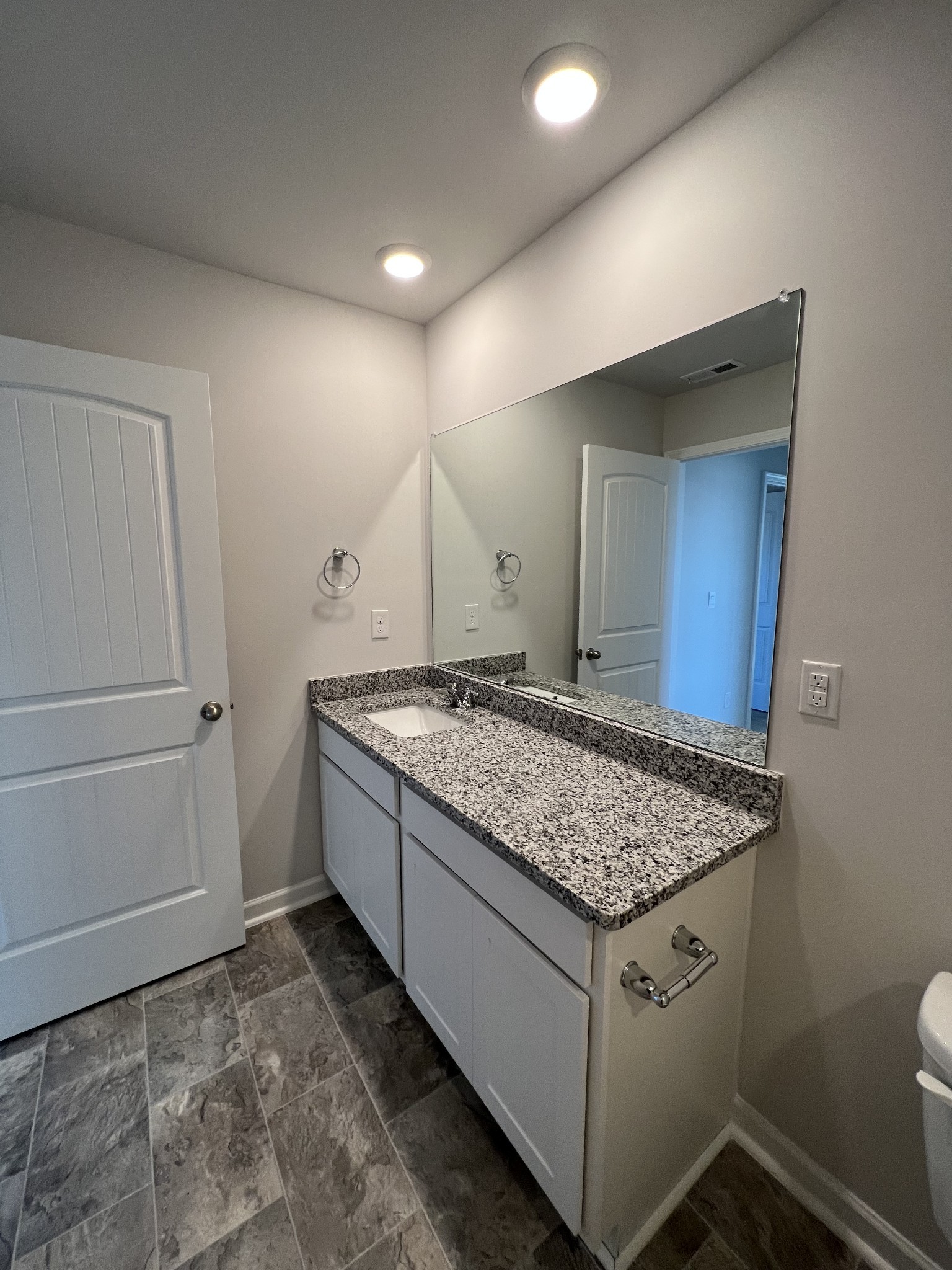 1703 Rylee Way Lebanon, TN 37087 - Photo 11 of 18 a bathroom with a granite countertop sink and a mirror