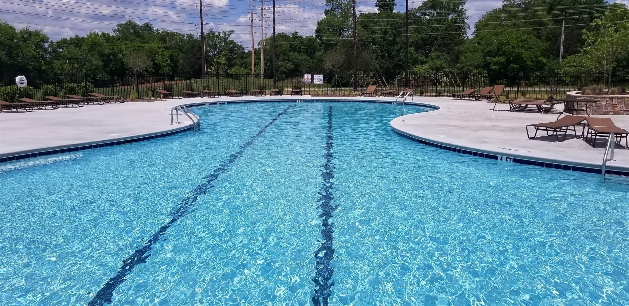 1703 Rylee Way Lebanon, TN 37087 - Photo 16 of 18 a view of a swimming pool with chairs