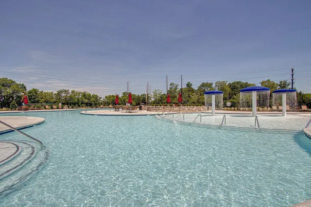 a view of a swimming pool and outdoor space