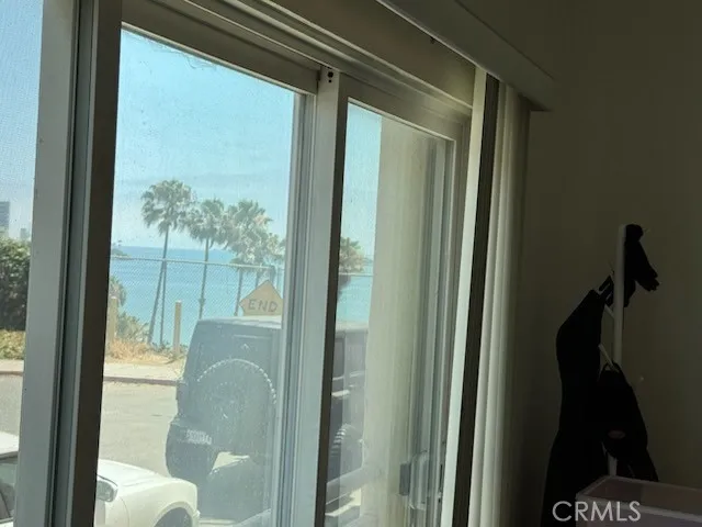 a view of a glass door and porch