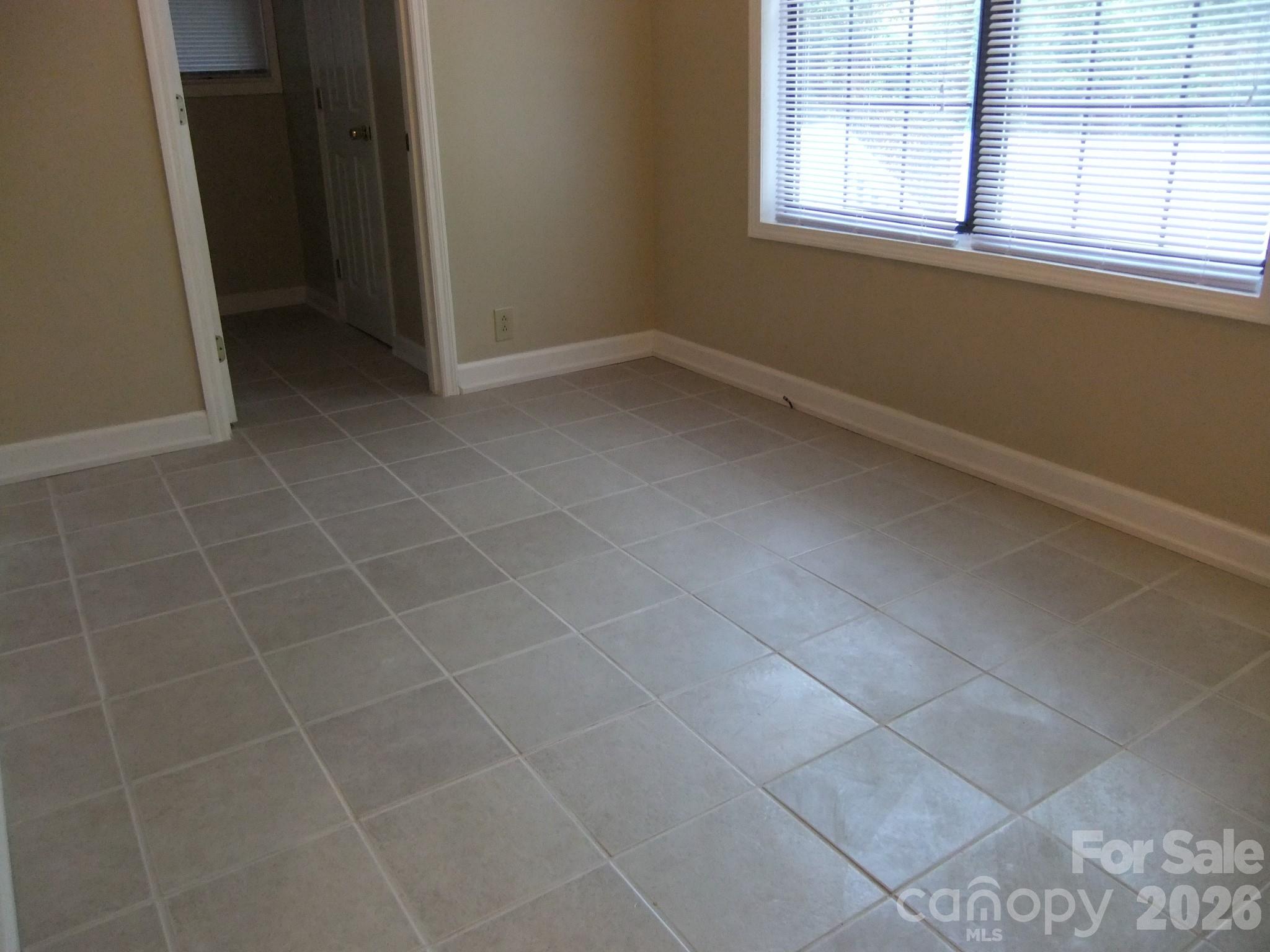 1631 Harris Road Fort Mill, SC 29708 - Photo 12 of 31 a view of an empty room with a window