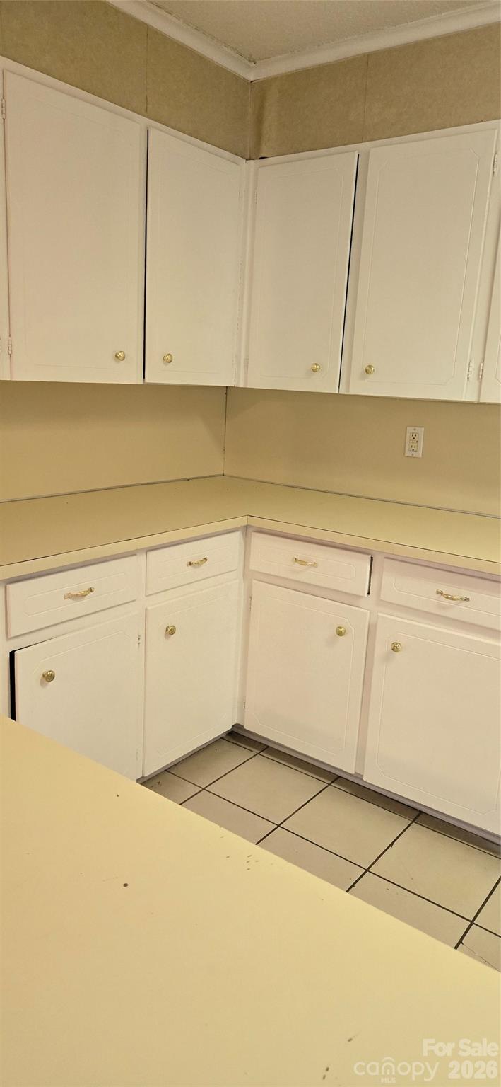 1631 Harris Road Fort Mill, SC 29708 - Photo 20 of 31 a view of a kitchen with white cabinets