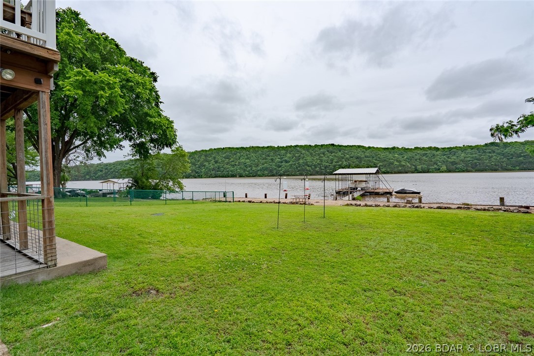 3135 Lick Creek Road Edwards, MO 65326 - Photo 65 of 94 level walk to the lake where the sellers feed hund