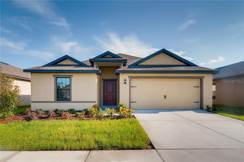 682 Killian Circle Deltona, FL 32738 - Photo 1 of 1 a front view of a house with a yard